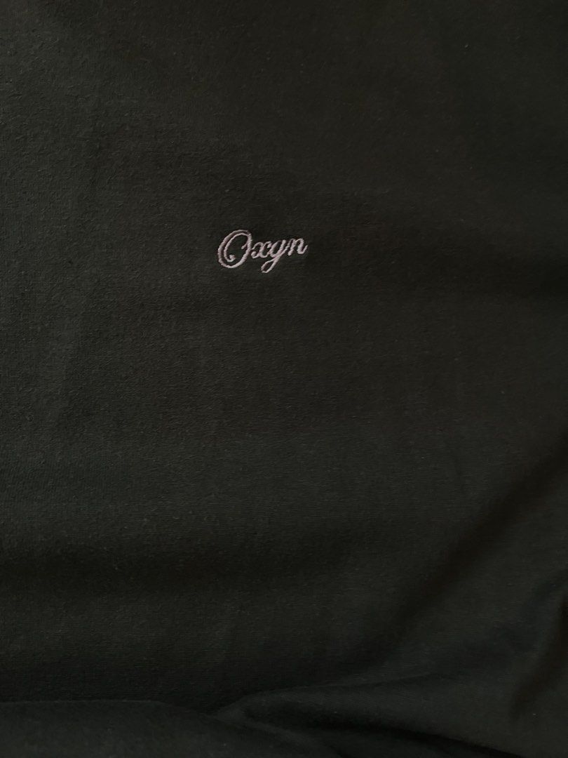 Oxygn Dark Green T-shirt (Category: Tshirts & Polo Shirts ) located in Baguio. Submitted by nickguard (Listing ID 1399052076, Image 2). Description: - Dark green Oxygn t-shirt - Size L - Issues : Ripped Tag.