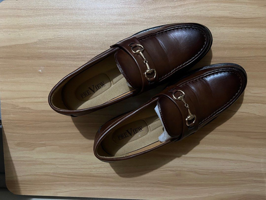 PreView Brown Loafers with Gold Detail (Category: Dress Shoes) located in Manila. Submitted by theprelovedbasics (Listing ID 1399220670, Image 2). Description: This brown loafers with gold plated hardware detail is from the brand PreView which is available in SM Department Stores. Looks good from casual to formal attire. Size 43. Original Box is no longer available but can provide one. RFS: Just only used twice. One for wedding and the other is f