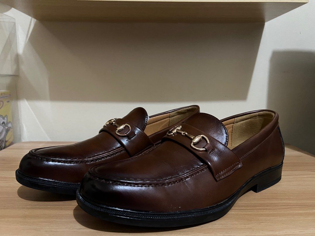PreView Brown Loafers with Gold Detail (Category: Dress Shoes) located in Manila. Submitted by theprelovedbasics (Listing ID 1399220670, Image 1). Description: This brown loafers with gold plated hardware detail is from the brand PreView which is available in SM Department Stores. Looks good from casual to formal attire. Size 43. Original Box is no longer available but can provide one. RFS: Just only used twice. One for wedding and the other is f