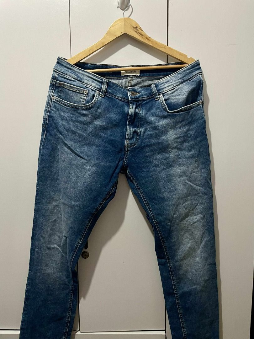 Pull&Bear Blue Jeans (Category: Jeans) located in Pasig City. Submitted by reesekirsten_ (Listing ID 1399167728, Image 2). Description: - Pull&Bear blue jeans - Classic five-pocket design - Faded wash effect - Leather brand patch at the back - Currently hanging on a wooden hanger.