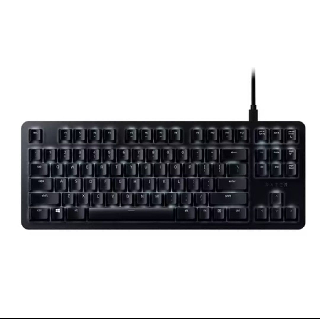 Razer BlackWidow Lite (Category: Computer Keyboard) located in Atimonan. Submitted by sneakerkid (Listing ID 1399089587, Image 2). Description: - Razer BlackWidow Lite - Complete with box papers and cable - Black keycaps - Wired connection - Standard layout with number row, function keys, and arrow keys - Backlit keys - Razer logo present.