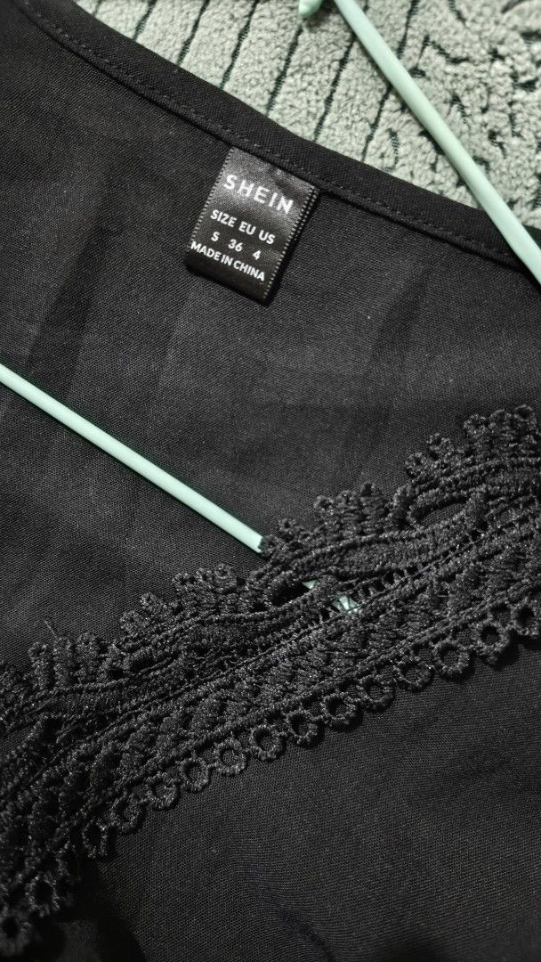 Shein Black Lace Trim Blouse (Category: Blouses) located in Rizal. Submitted by declutterwithliz (Listing ID 1399094390, Image 2). Description: - Shein black blouse - V-neck with lace trim - Long sleeves with lace cuffs - Size S (EU 36, US 4) - Perfect for a sophisticated look.