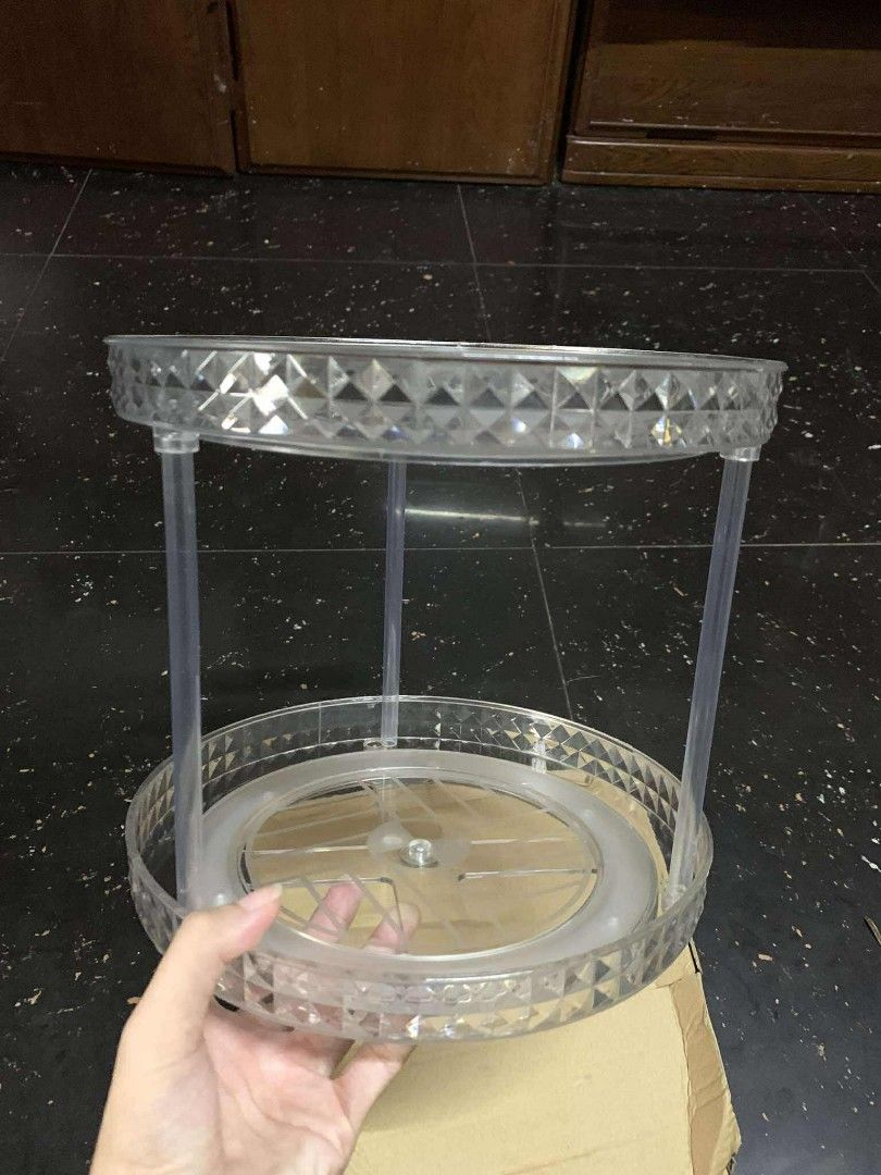 Shein Crystal Rotating Storage Organizer 2 Layers (Category: Storage Boxes & Baskets) located in Batangas. Submitted by cmaryjoy9060312 (Listing ID 1399109030, Image 2). Description: - Crystal rotating storage organizer - Two-layer design - Diamond-shaped and transparent - Ideal for cosmetics, skincare, and small items - Comes in original packaging.