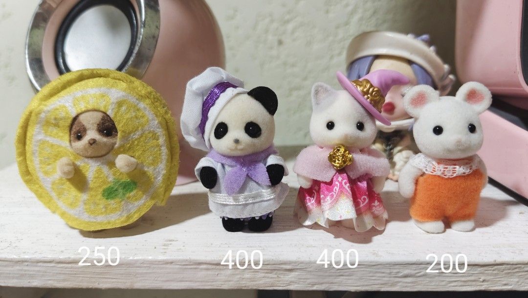 sylvanian families random critters (Category: Figurines & Statues) located in Taguig. Submitted by idfkuroo (Listing ID 1399169668, Image 1). Description: wts lfb random critters for tingi 250 - chihuahua in lemon costume 400 - baby baker panda 400 - wizard latte cat - SOLD 200 - marshmallow mouse prices are fixed (unless taking 2 or more), no lowballing. x sensi but in good condi (except for chihuahua, may balding siya sa face and thin fur sa pa