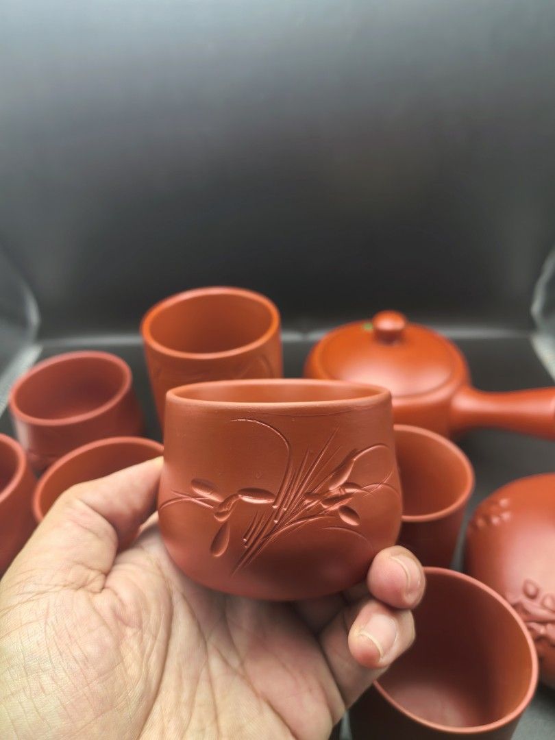 Tea Pot Set Red Clay Ceramic Set of 12 (Category: Coffee & Tea Tableware) located in Cebu City. Submitted by dudes_villanueva (Listing ID 1399057192, Image 3). Description: Tea Pot Set Red Clay Ceramic Set of 12 📌With 2 Types of Pot 📌And 10 Teacups of different size. 📌Teapot is good for 2-3 cups..