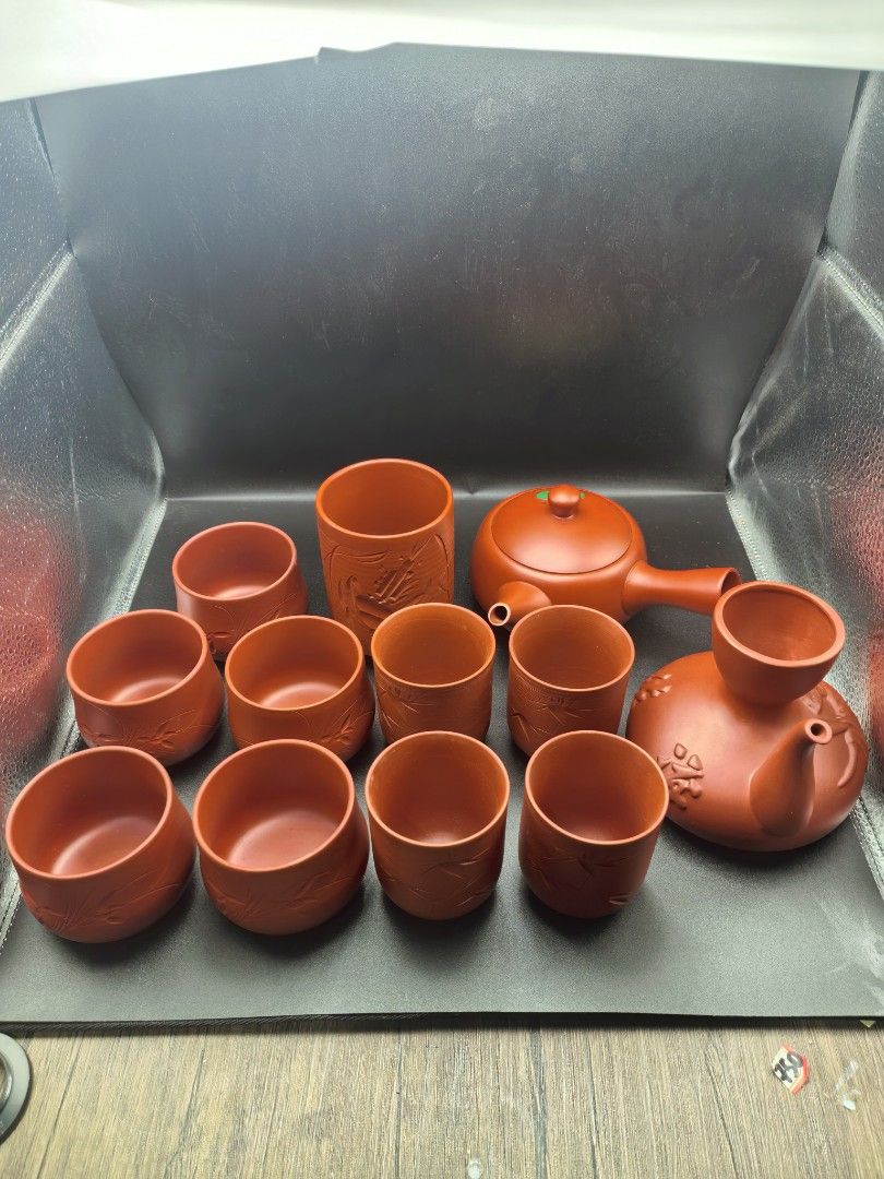 Tea Pot Set Red Clay Ceramic Set of 12 (Category: Coffee & Tea Tableware) located in Cebu City. Submitted by dudes_villanueva (Listing ID 1399057192, Image 1). Description: Tea Pot Set Red Clay Ceramic Set of 12 📌With 2 Types of Pot 📌And 10 Teacups of different size. 📌Teapot is good for 2-3 cups..