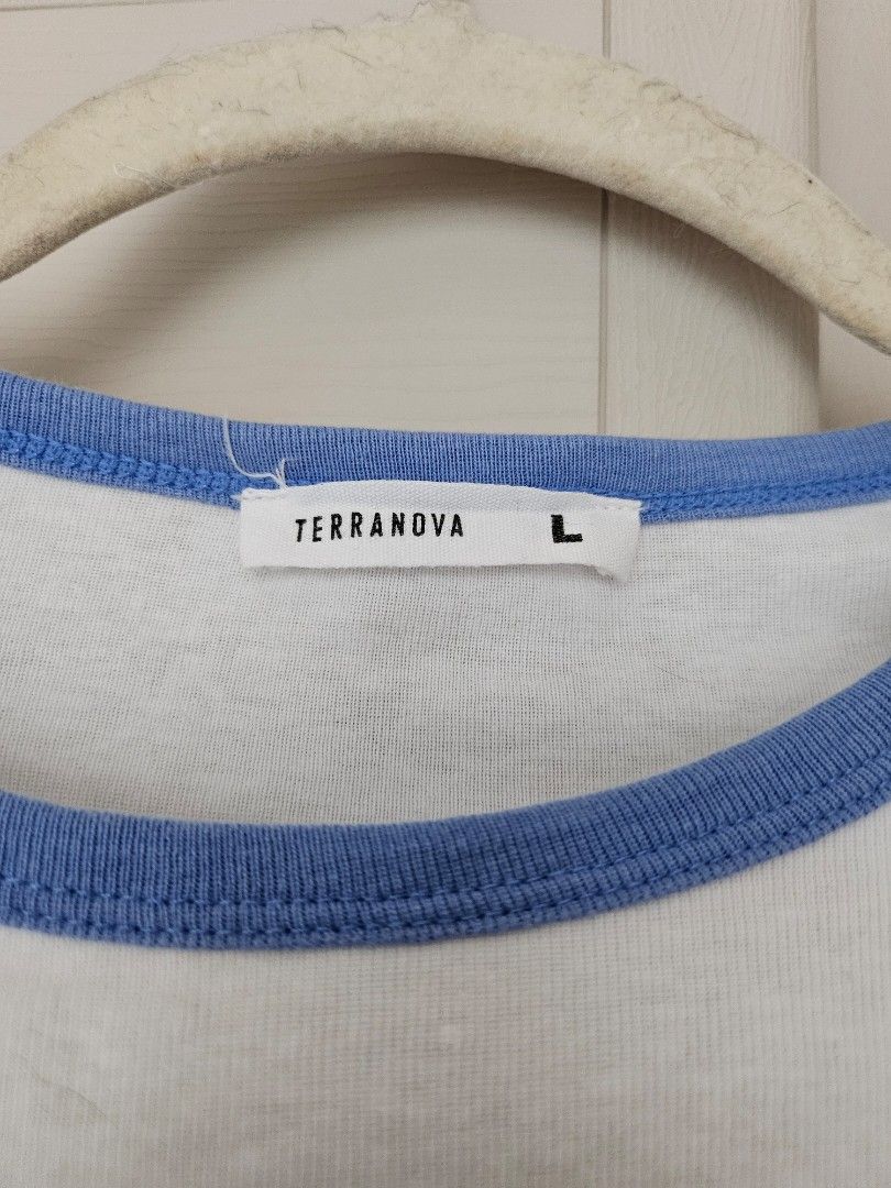 Terranova Los Angeles Tshirt Size L (Category: Shirts) located in Pasig City. Submitted by wardrobeez (Listing ID 1399056739, Image 2). Description: - Terranova T-shirt - Size: L but can fit to M - Color: White with blue trim - Design: "LOS ANGELES CALIFORNIA" - Neckline: Round - Sleeves: Short.
