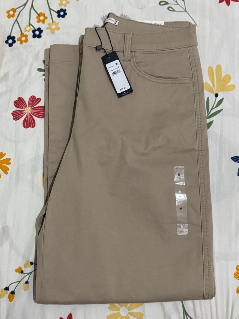 Tommy Hilfiger TH Flex Wide Leg Pants - Size 6 (Category: Other Bottoms) located in Orani. Submitted by xtine_rose (Listing ID 1399149669, Image 2). Description: - Tommy Hilfiger TH Flex wide leg pants - Neutral beige color - Size 6 - High-rise waist - Classic design with button closure and pockets - New with tags - Retail price: "$79.50".