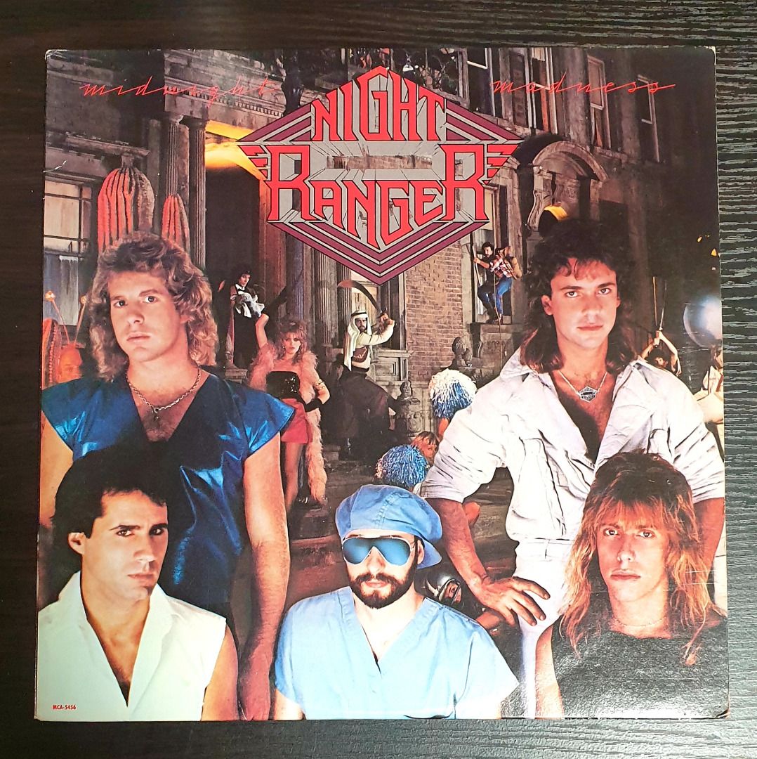 [Vinyl LP] Night Ranger – Midnight Madness (Category: Vinyls) located in Cainta. Submitted by bunnygod (Listing ID 1399090426, Image 1). Description: US pressed, 1983 MCA Records – MCA-5456 📀 VG+ 📂 VG+ 🎶 Rock A1 (You Can Still) Rock In America A2 Rumours In The Air A3 Why Does Love Have To Change A4 Sister Christian B1 Touch Of Madness B2 Passion Play B3 When You Close Your Eyes B4 Chippin' Away B5 Let Him Run.