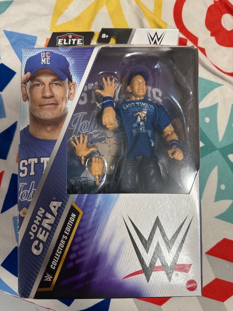 WWE Elite John Cena Collector's Edition (Category: Action & Battle Toys) located in Pasig City. Submitted by philzyper (Listing ID 1399217253, Image 1). Description: - WWE Elite John Cena Collector's Edition - Features John Cena in 'Last Time' attire - Includes interchangeable hands - Packaging details John Cena's career highlights and farewell tour - Collector's Edition item.