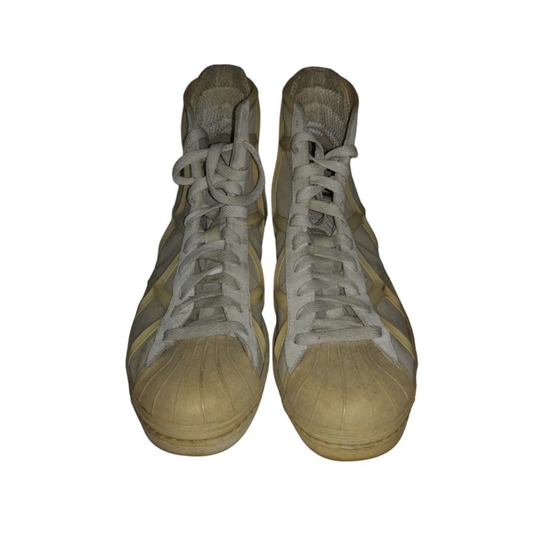 Yohji Yamamoto x Adidas "X" Mid-cut Shoes (Cream Yellow, 8) (Category: Sneakers) located in General Mariano Alvarez. Submitted by hundred_lives (Listing ID 1392129429, Image 1). Description: Yohji Yamamoto x Adidas X-Edition Mid-cut Shoes (Cream Yellow, 8) Authentic Original Distressed Condition Tags: rider harley davidson von dutch gothic punk affliction von dutch rave alt core punk gothic steel knuckles billie eilish studs ed hardy christian au
