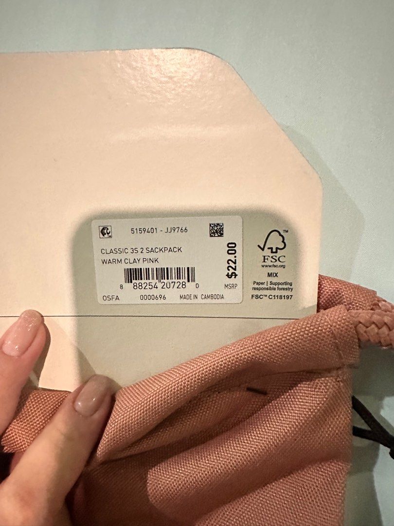 Adidas Classic 3S 2 Sackpack - Warm Clay Pink (Category: Backpacks) located in Manila. Submitted by brielliant (Listing ID 1396038598, Image 2). Description: - Adidas Classic 3S 2 Sackpack - Color: Warm Clay Pink - Main compartment with drawstring closure - Front pocket with zipper - Adidas logo detail - Made in Cambodia.