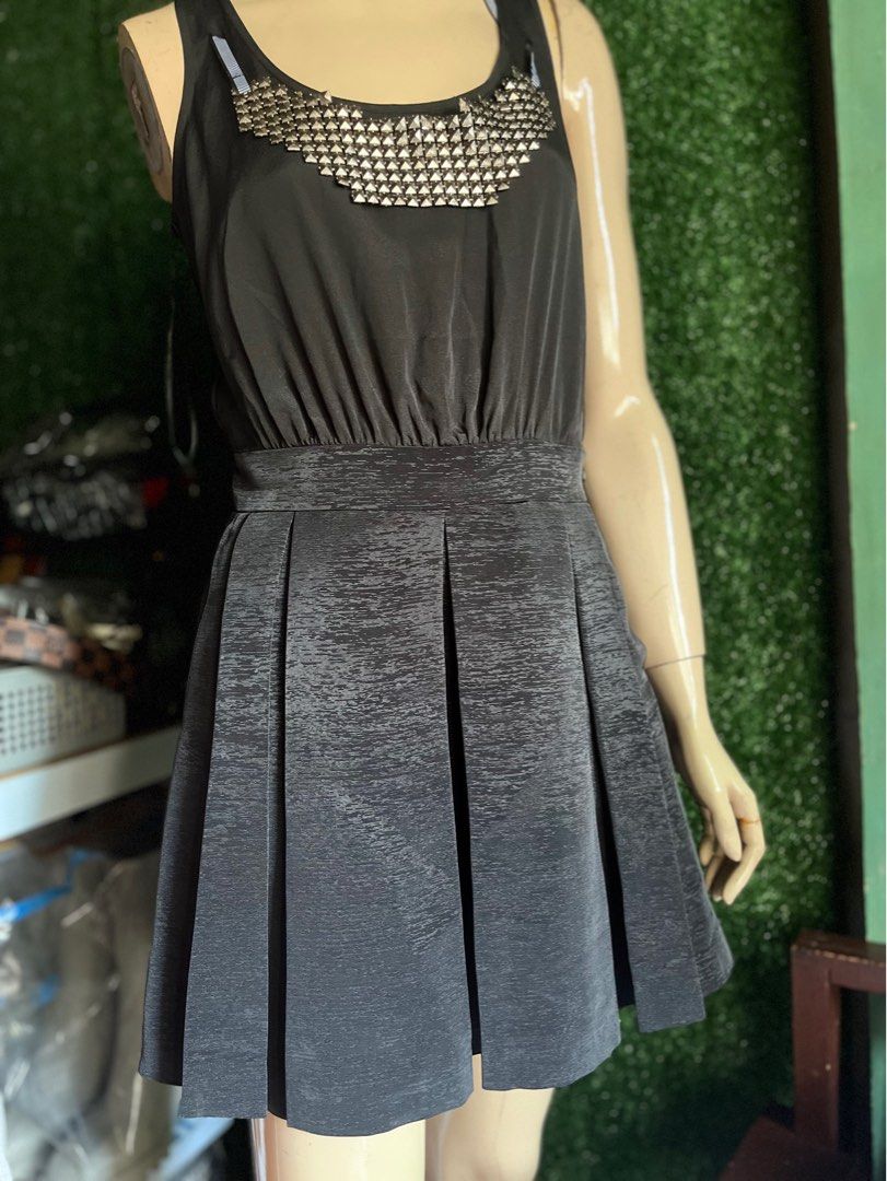 BCBG Generation Black Dress (Category: Dresses) located in Angeles City. Submitted by goodbuysathome (Listing ID 1395952861, Image 1). Description: - BCBG Generation black dress - Size xs- small womens - Pleated skirt - Unique neckline with silver embellishments - Keyhole back - Side zipper with button details - Approximately 30 inches long Measurements on photos Add sf 64 Gcash payment .