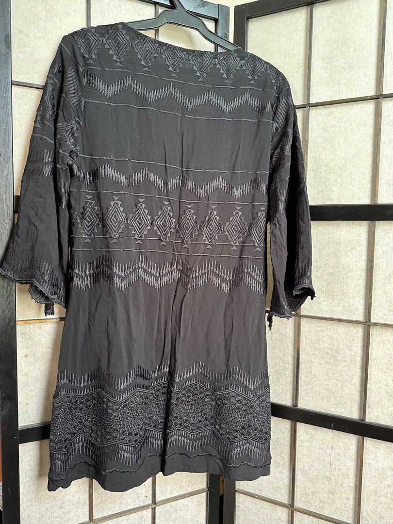 Black Embroidered Dress (Category: Dresses) located in Manila. Submitted by echrise (Listing ID 1395953691, Image 3). Description: Bust - 41” Length - 32” Can be used as cover up. - La Blanca black dress - Intricate embroidery details - V-neckline - Three-quarter sleeves - Relaxed fit - Geometric and floral patterns - Crochet-like design on neckline and hem .