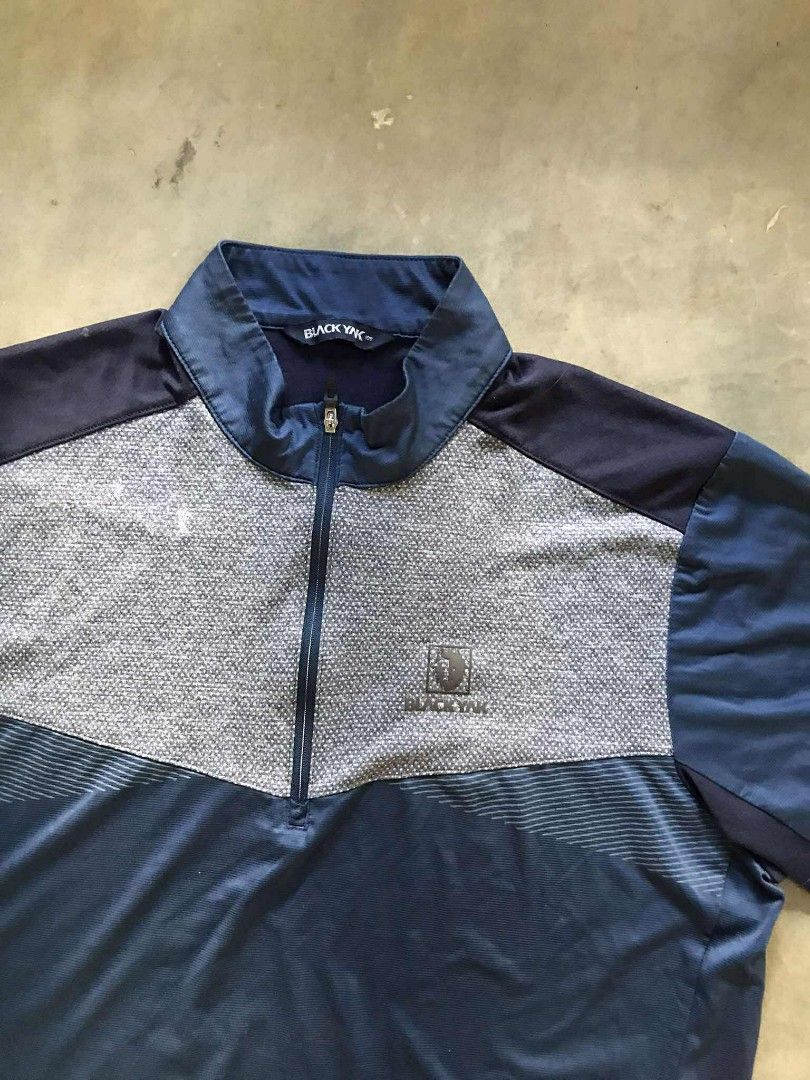 Black Yak Polo Shirt (Category: Tshirts & Polo Shirts ) located in Argao. Submitted by thrift_ni_ar (Listing ID 1396022040, Image 2). Description: - Black Yak polo shirt - Color: Navy blue and gray - Quarter-zip closure - Short sleeves - Black Yak logo on chest - Lightweight, athletic material - Navy blue collar with Black Yak branding BLACK YAK HALFZIP OUTDOOR SHIRT‼️ GREAT CONDITION SIZE XLARGE W 21 / L 29 COLORATE 9.5 / 10 ISSUE : STAIN 300 + 