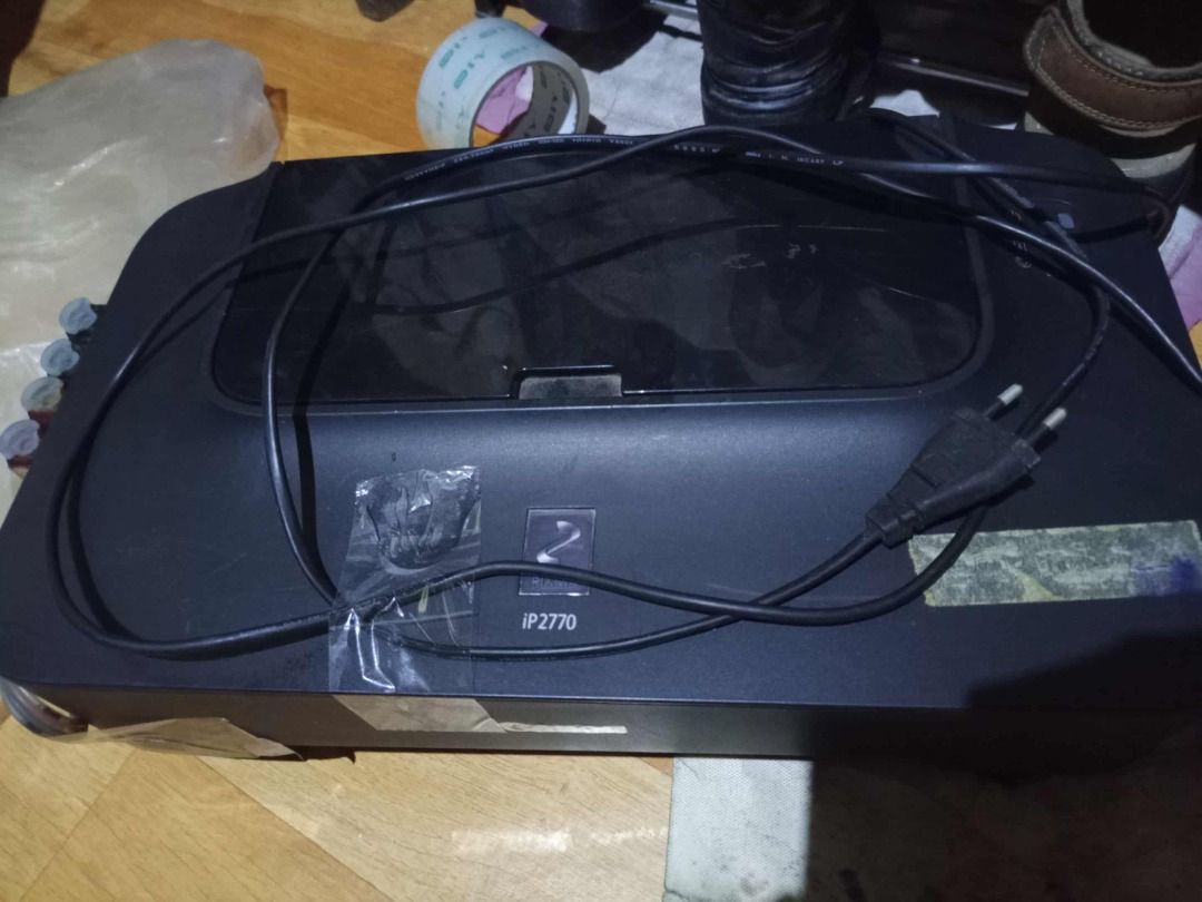 Canon PIXMA iP2770 Printer (Category: Printers, Scanners & Copiers) located in Rizal. Submitted by johnmontenegro (Listing ID 1396072966, Image 1). Description: Canon Pixma IP2770 Inkjet Printer can print A4 borderless photos of size 4"" x 6"" or 8"" x 10"". It can print at speeds of 7 inches per minute for A4 sized plain paper in black and white quality. The printed images are produced at a resolution of up to 4800 x 1200dpi. You can also print 