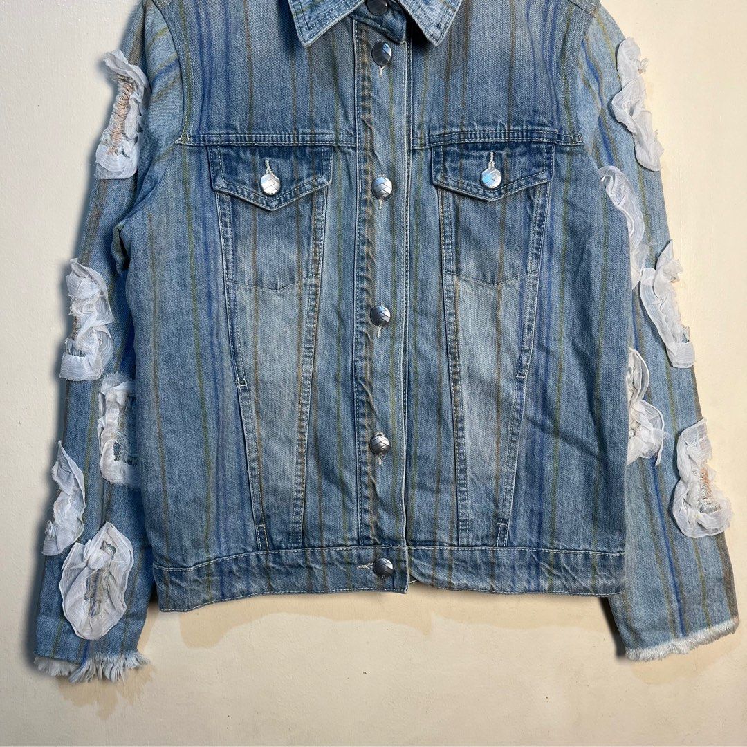 Chanel Waterfall Series Blue Camelia Denim Jacket (Category: Coats, Jackets and Outerwear) located in Calamba. Submitted by lgnhustler_18 (Listing ID 1396060756, Image 2). Description: Chanel Waterfall Series Blue Camelia Denim Jacket Size: 38 Laid Flat Measurements: Length: 24 inches Width: 20.4 inches Sleeve Length: 24.4 inches Shoulder: 16.3 inches Hem: 19.9 inches Condition: Excellent Flaws: Missing Main Tag ₱3,850 + sf.