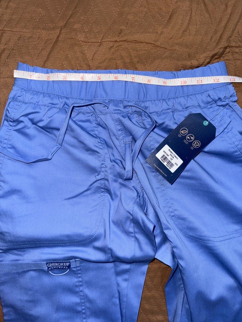Cherokee Women's Scrub Pants (Category: Other Bottoms) located in Butuan. Submitted by clickandsave (Listing ID 1396019134, Image 1). Description: - Ceil blue Cherokee scrub pants XXS Petite - Elastic waistband with drawstring - Two front and back pockets - Small pocket on right leg - Straight leg cut - Brand new with tag -Never worn just fitted too small for me -Get both top and pants for discounted price!.