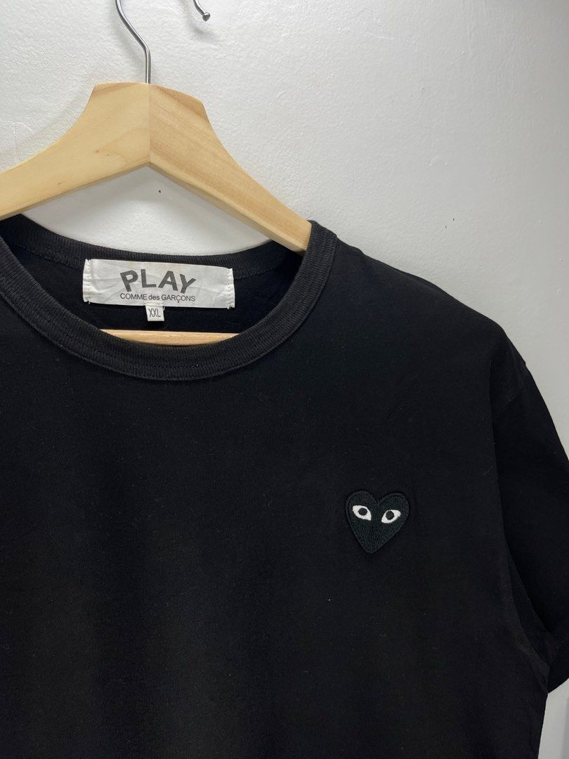 Comme des Garcons Play Black T-shirt (Category: Shirts) located in Cavite. Submitted by robievillon (Listing ID 1396094076, Image 1). Description: 23x29” - Authentic Comme des Garcons Play t-shirt - Classic black color - Size: Large - Iconic heart with eyes logo - Made in Japan - Material: 100% cotton - Care: Hand wash only, no bleach.