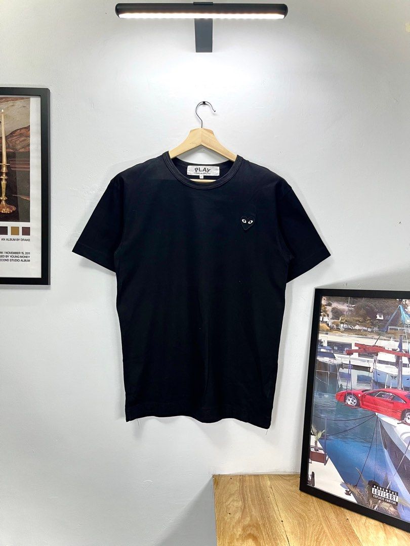 Comme des Garcons Play Black T-shirt (Category: Shirts) located in Cavite. Submitted by robievillon (Listing ID 1396094076, Image 3). Description: 23x29” - Authentic Comme des Garcons Play t-shirt - Classic black color - Size: Large - Iconic heart with eyes logo - Made in Japan - Material: 100% cotton - Care: Hand wash only, no bleach.