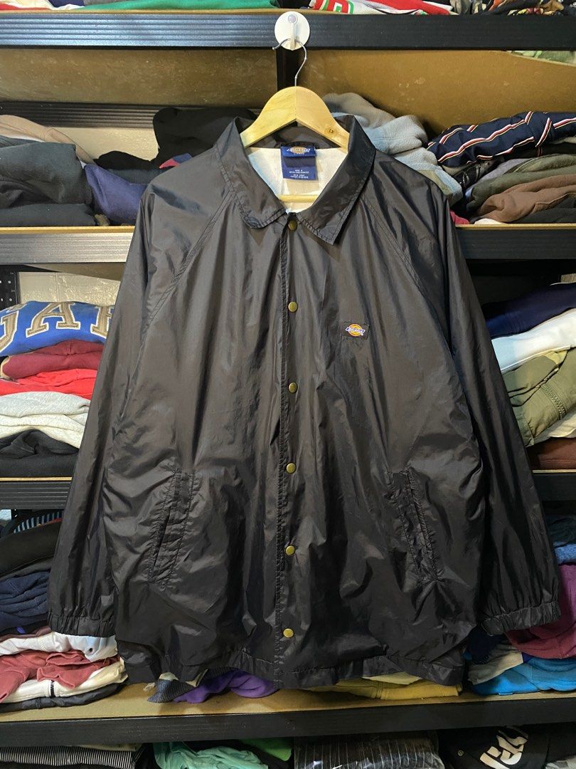 Dickies Coach Jacket - Large (Category: Coats, Jackets and Outerwear) located in Cavite. Submitted by dracokidstuff (Listing ID 1396074931, Image 1). Description: - Black Dickies coach jacket - Size: Large - Features: Button-up front, collar, two front pockets - Interior lining: White - Made in United Arab Emirates - Material: Nylon - Visible Dickies logo on chest Dickies Black Coach Jacket Size: Large Dimes: W26 L31 SL25 Excellent condition No i