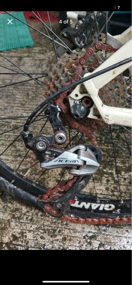 Giant ATX Mountain Bike (Category: Bicycles) located in Manila. Submitted by outofcloset2023 (Listing ID 1395944352, Image 2). Description: - Giant ATX mountain bike - White frame with blue accents - Shimano Alera rear derailleur - Suntour XCT front suspension - Bontrager wheels.