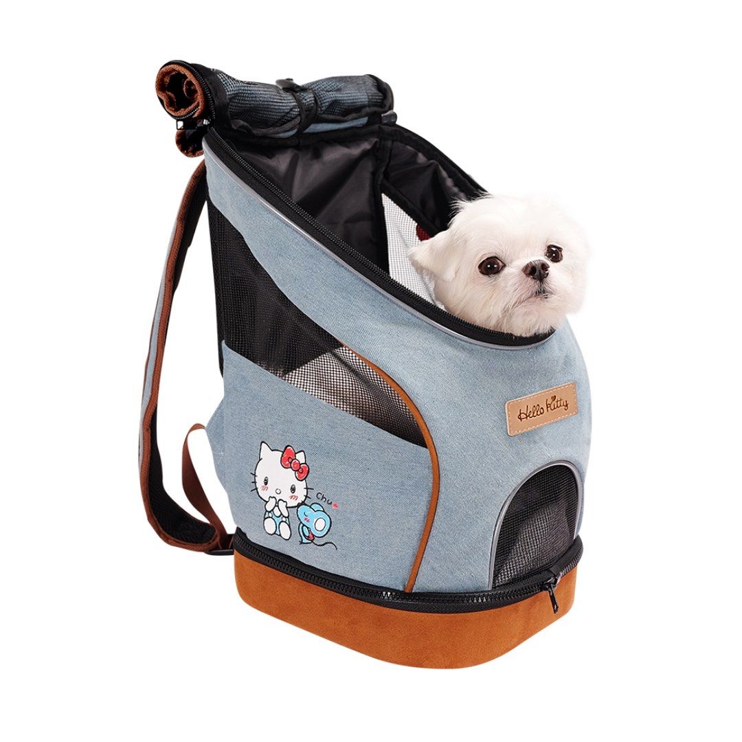 Ibiyaya Hello Kitty Denim Fun lightweight backpack (Category: Homes & Other Pet Accessories) located in Manila. Submitted by cilim785 (Listing ID 1396082499, Image 2). Description: - Kitty pet carrier backpack - Ideal for small dogs and cats - Features a cute Kitty design - Made with denim-like fabric and brown accents - Includes mesh panels for ventilation - Zippered bottom for easy access - Adjustable straps for comfortable carrying - Designed 