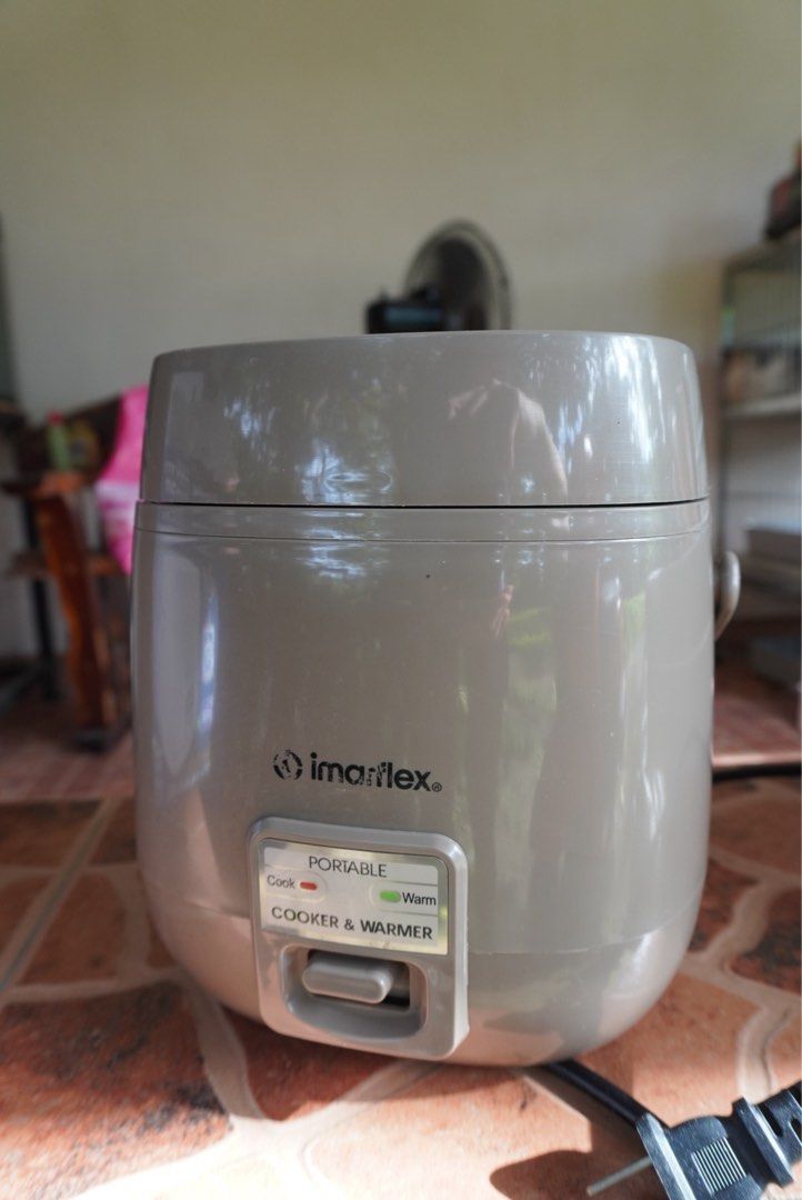 Imarflex Portable Cooker & Warmer IRJ-60T BR (Category: Cookers) located in Batangas. Submitted by fastidiouss (Listing ID 1395940062, Image 1). Description: RFS: Moved out of condo. Will no longer use. Fully functional. Box and warranty card are included. - Imarflex portable cooker and warmer. - Cool-touch cover and steam vent. - Cook/warm light indicator. - Cooks up to 3 cups of rice. - Ideal for work, school, and travel..