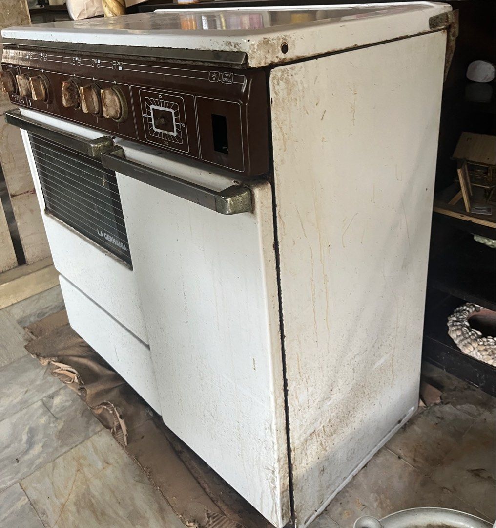 La Germania Gas Range Oven (Category: Cookers) located in Paranaque City. Submitted by shimpdesk (Listing ID 1395938977, Image 3). Description: La Germania Gas Range Oven - 4 gas burner, 1 electric (220v) rfs: decluttering Issues: - for full restoration (buy at own risk) - 1 knob missing, switch missing, plug needs replacement - repairs and deep cleaning needed Logistics c/o buyer .