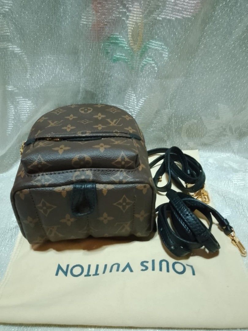 Louis Vuitton Mini Backpack (Category: Luxury Bags & Wallets) located in Tuguegarao City. Submitted by starzeke (Listing ID 1396089726, Image 2). Description: - Louis Vuitton Mini Backpack - Iconic Monogram pattern - Top handle and detachable strap (shoulder/crossbody) - Black fabric interior with small pocket - Includes dust bag - Gold-toned hardware.