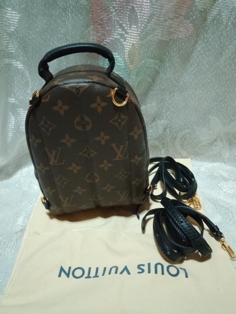 Louis Vuitton Mini Backpack (Category: Luxury Bags & Wallets) located in Tuguegarao City. Submitted by starzeke (Listing ID 1396089726, Image 3). Description: - Louis Vuitton Mini Backpack - Iconic Monogram pattern - Top handle and detachable strap (shoulder/crossbody) - Black fabric interior with small pocket - Includes dust bag - Gold-toned hardware.