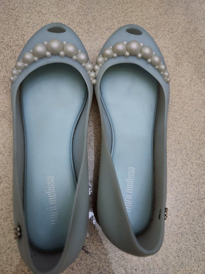 Melissa Pearl Embellished Flats (Category: Babies & Kids Fashion) located in Santa Rosa. Submitted by huichita (Listing ID 1396064012, Image 1). Description: - Light blue Melissa flats - Adorned with pearl embellishments - Visible Melissa branding on insole - Rounded toe design - Made of soft, flexible plastic - Small heel.