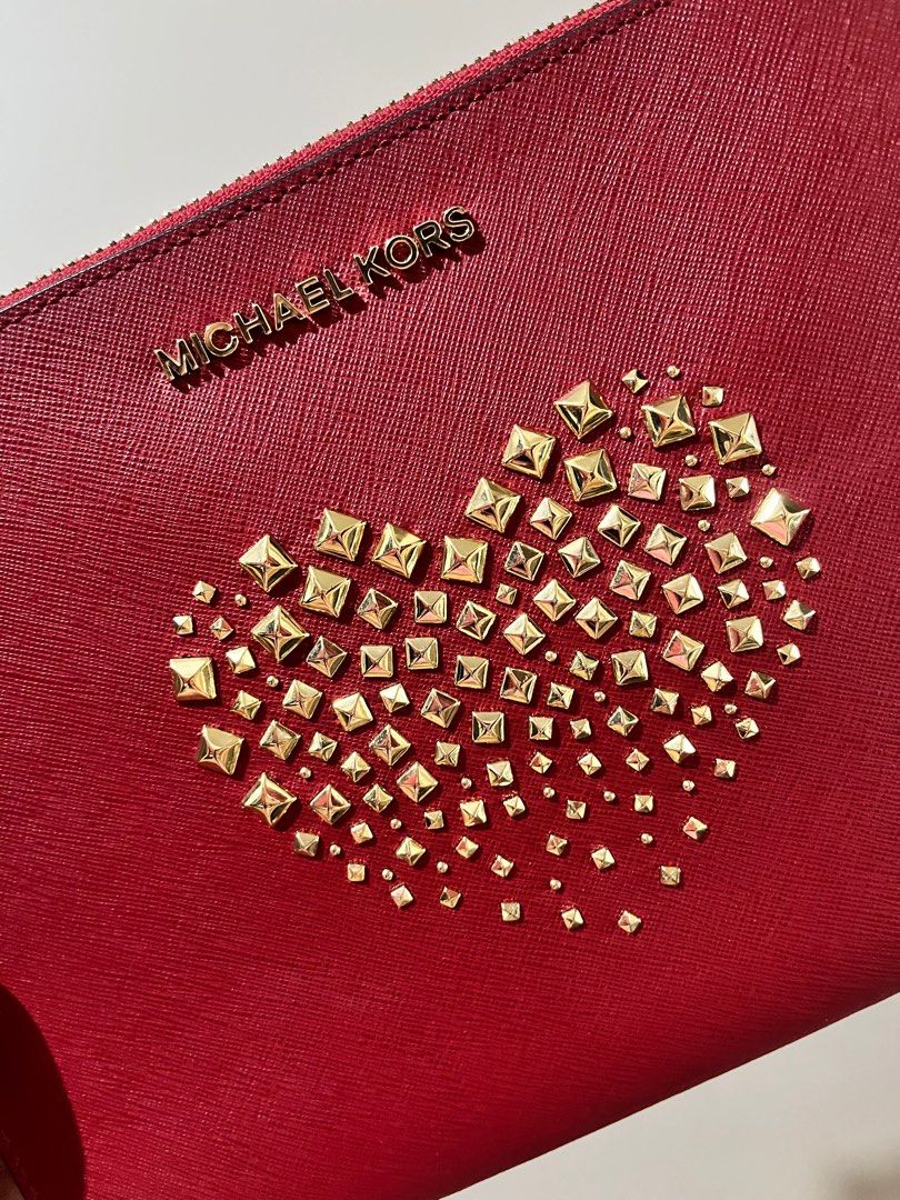 Michael Kors Studded Wrist Pouch/ Wallet (Category: Wallets & Card holders) located in Manila. Submitted by msmarjsc (Listing ID 1396061395, Image 3). Description: Original and almost new! 6 Card Slots inside! QR Code seen on photos ✨ All items posted are bought & sourced in Tokyo, Japan 🇯🇵 Still negotiable, pm your offers let’s make a deal! ✨ Meet - ups & delivery are ok 🤝.