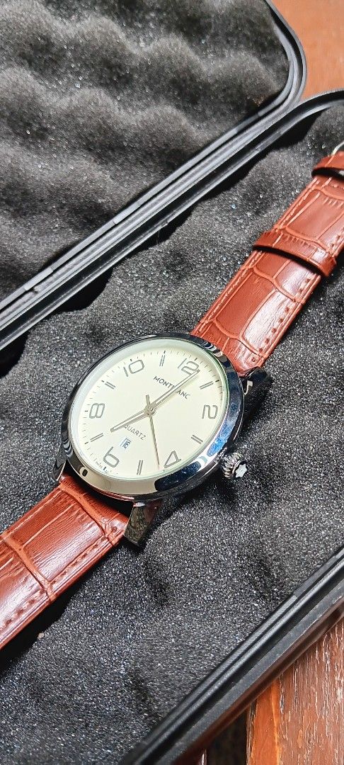 Montblanc Watch (Category: Luxury Watches) located in Quezon City. Submitted by bong_austria24 (Listing ID 1396053928, Image 1). Description: - Montblanc watch - Silver case - Cream-colored dial - Luminous hands and markers - Date display at 6 o'clock available in black and brown leather strap (hindi po isang watch 2 strap kasama magka iba po yan) price - 1850.
