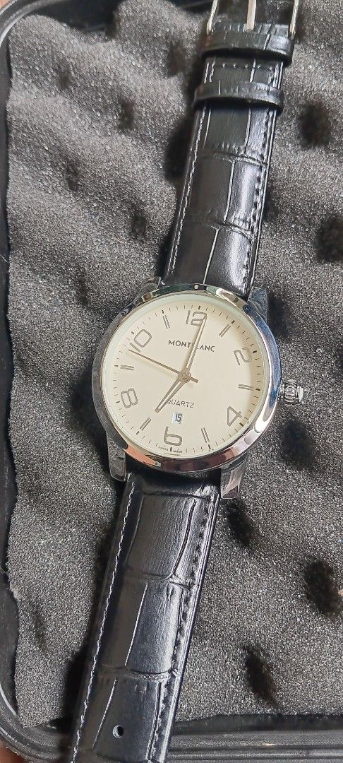 Montblanc Watch (Category: Luxury Watches) located in Quezon City. Submitted by bong_austria24 (Listing ID 1396053928, Image 2). Description: - Montblanc watch - Silver case - Cream-colored dial - Luminous hands and markers - Date display at 6 o'clock available in black and brown leather strap (hindi po isang watch 2 strap kasama magka iba po yan) price - 1850.
