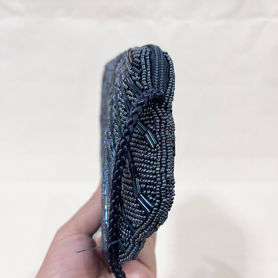 Shell Design Navy Blue Beaded Shell Clutch / Crossbody Bag (Category: Clutches) located in Antipolo. Submitted by aristokai (Listing ID 1396076984, Image 3). Description: ✅ Like new condition and no flaws ✅ Very nice beaded small bag, lined interior, and unique shell design ✅ Can fit small items (Di po kasya ang cellphone! Maybe yung foldable ZFlip can fit) ☺️ Please feel free to make an offer! Payment options: ❤️ Cash on Delivery thru LBC door t