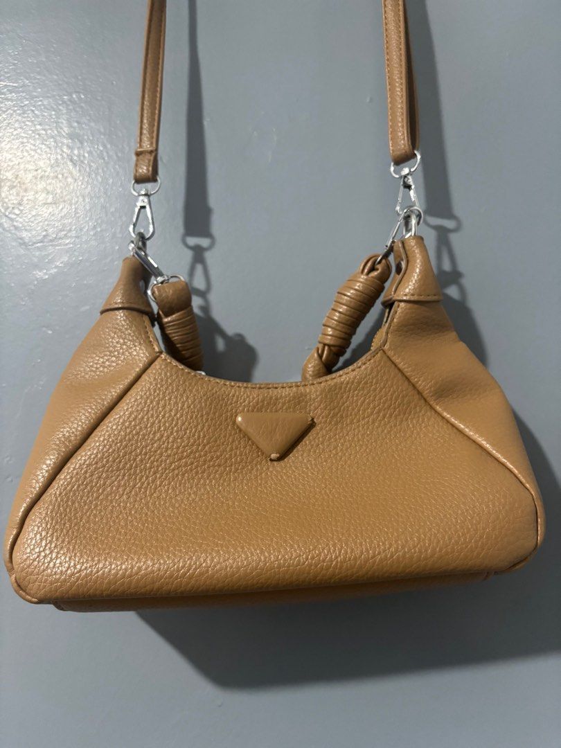 Paris Leather Sling Bag (Category: Shoulder Bags) located in Manila. Submitted by jing3021 (Listing ID 1395994196, Image 1). Description: 2 straps inclusion Zipper closure 10.5 x 5” .