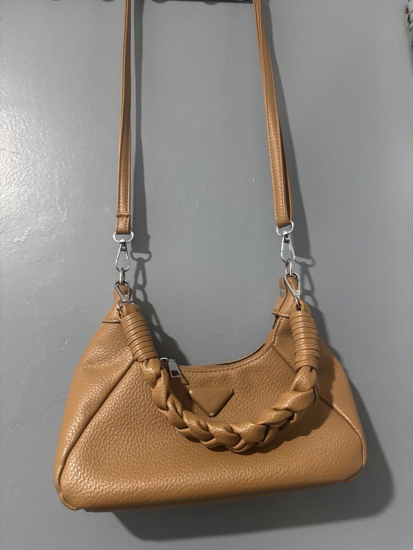 Paris Leather Sling Bag (Category: Shoulder Bags) located in Manila. Submitted by jing3021 (Listing ID 1395994196, Image 3). Description: 2 straps inclusion Zipper closure 10.5 x 5” .