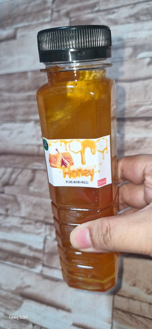 Pure Raw Wild Honey (Category: Other Food & Drinks) located in Mandaluyong City. Submitted by Cel_EB23 (Listing ID 1395983533, Image 1). Description: - 100% Original Honey - No added sugar or preservatives - Perfect for milk and tea - Kid-friendly! - Available in different sizes - Long-lasting.