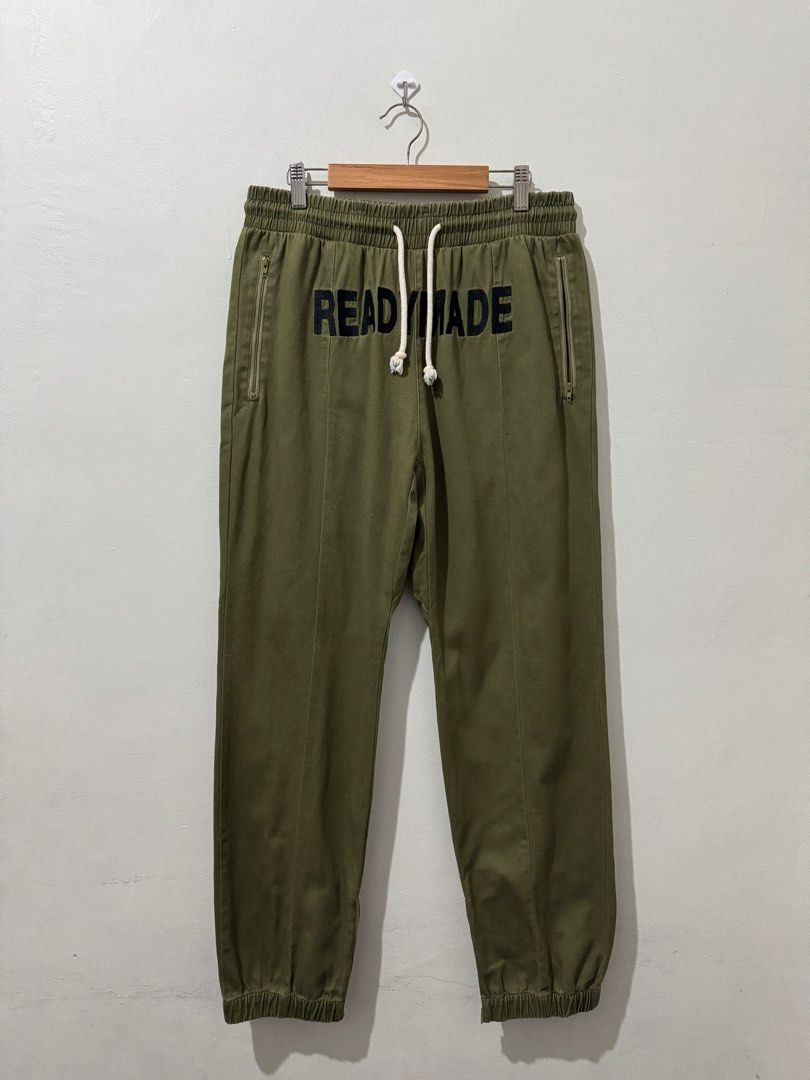 Readymade Embroidered Logo Track Pants (Category: Joggers) located in Meycauayan. Submitted by itstimothrifts (Listing ID 1395953576, Image 1). Description: Readymade Embroidered Logo Track Pants Excellent Condition Need rewash Size 2 on tag Large Width 30-35 Length 39.5 Leg Opening 6 Front Rise 14.