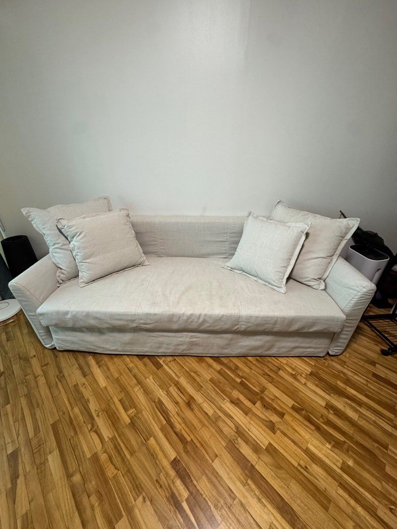 Ikea 3 Seater Sofa Bed, Holmsund, Borgunda Beige (Category: Sofas) located in Makati City. Submitted by migimp88 (Listing ID 1396014232, Image 1). Description: - Sofa bed with light-colored fabric - Converts into a bed thats fits 2 easy - Includes multiple matching pillows - Firm feel - Ideal for small spaces and guest rooms.