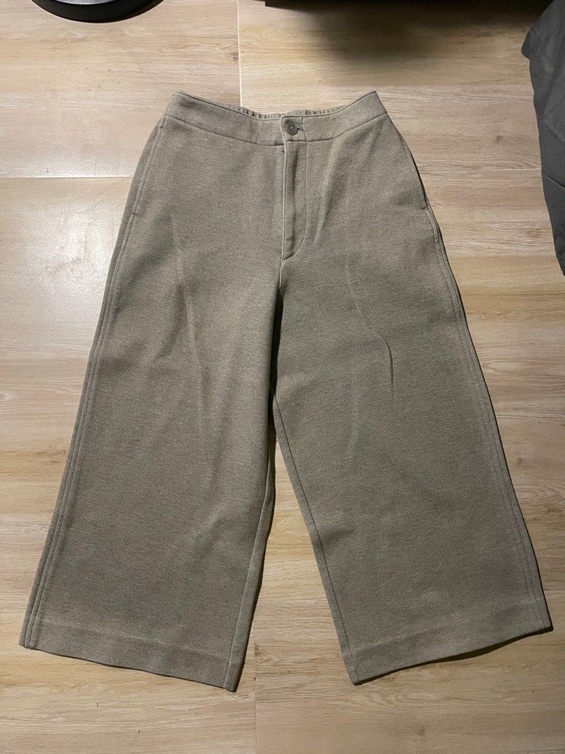 Uniqlo Wide 3/4 Pants (Category: Other Bottoms) located in Batangas. Submitted by hellocedi (Listing ID 1396075596, Image 1). Description: - Uniqlo wide pants - Neutral beige color - Comfortable wide-leg design - Waist: 60-66cm - Hip: 85-91cm - Made in China - Features two back pockets and button closure - Perfect for work or casual wear - Thick fabric - Used for work twice Hindi pa nagamit masyado. Nakatahi pa yung back pockets (kayo na po mag c