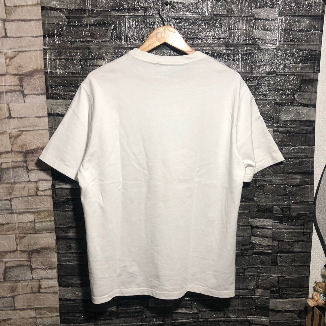 We11done Bunny Graphic T-shirt (Category: Luxury Apparel) located in Manila. Submitted by flex_curation (Listing ID 1396057079, Image 3). Description: DIMES 23x27 550 PESOS ONLY BACOOR CAVITE LOC White We11done T-shirt Features a bunny graphic on the front (black and red) Brand name printed below the graphic Crew neck.