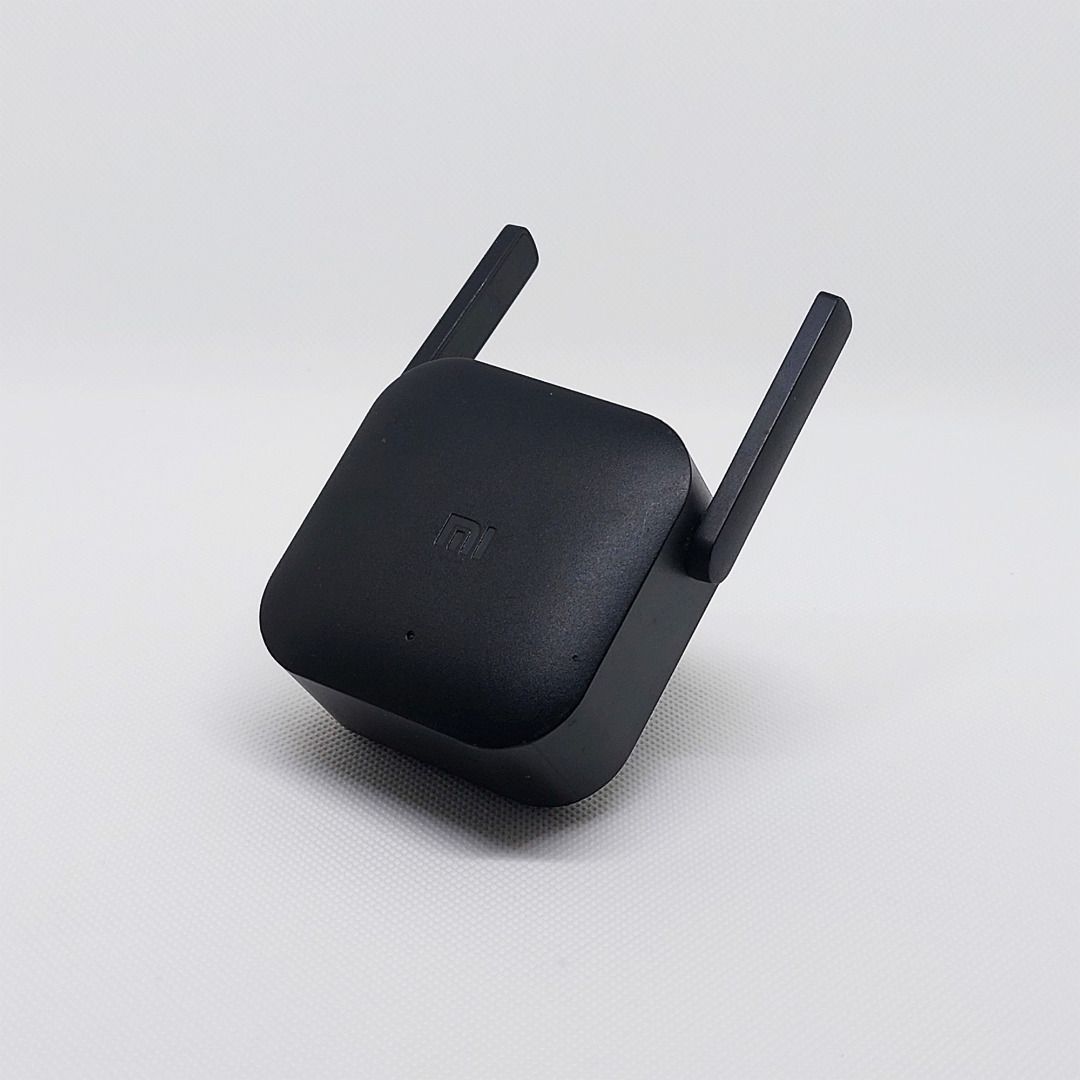 Xiaomi R03 Mi Wi-Fi Range Extender Pro [Issue: No Power] (Category: Networking) located in Allen. Submitted by omoriii (Listing ID 1396043393, Image 1). Description: - **Xiaomi R03 WiFi Amplifier Pro – 300Mbps 2.4GHz** - With 2 antennas for better signal - Works as a network expander / wireless router - Condition: **Not working (no power)** - I don’t know how to fix it - No time to bring it to a technician - Good for parts or repair.