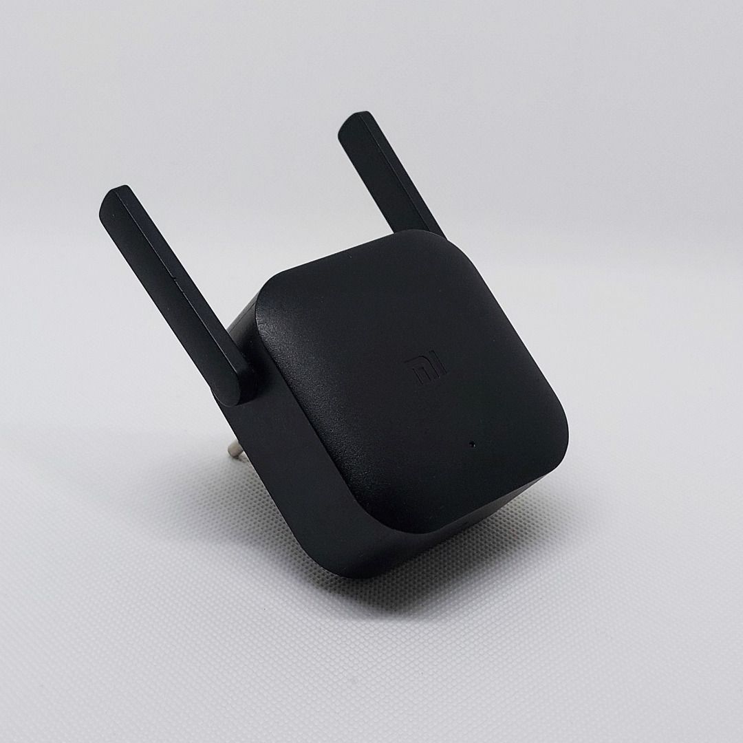 Xiaomi R03 Mi Wi-Fi Range Extender Pro [Issue: No Power] (Category: Networking) located in Allen. Submitted by omoriii (Listing ID 1396043393, Image 2). Description: - **Xiaomi R03 WiFi Amplifier Pro – 300Mbps 2.4GHz** - With 2 antennas for better signal - Works as a network expander / wireless router - Condition: **Not working (no power)** - I don’t know how to fix it - No time to bring it to a technician - Good for parts or repair.