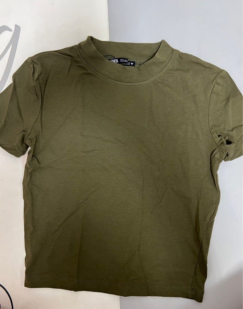 Zara Plain Top BNWOT (Category: Blouses) located in Quezon City. Submitted by currentlydeclutterring (Listing ID 1395957495, Image 1). Description: Semi stretch.