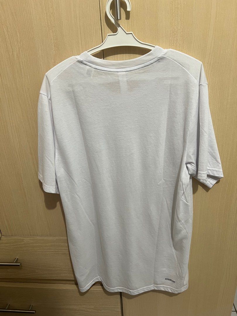 Adidas Aeroready White T-shirt (Category: Activewear) located in Quezon City. Submitted by stmman (Listing ID 1399362849, Image 2). Description: - Adidas Aeroready T-shirt - Color: White - Size: A/M - Aeroready - Short sleeves - Condition: Some stains on the sleeve Buyer will cover shipping fee Mode of payment Gcash .