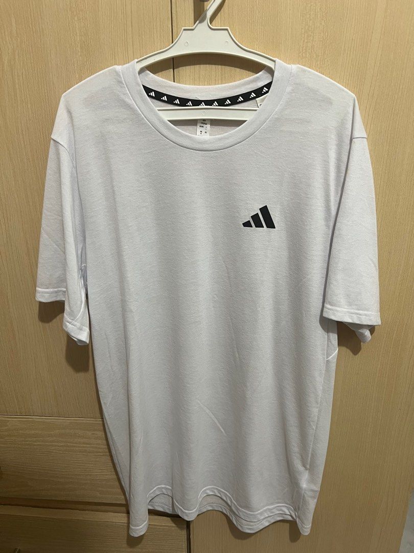 Adidas Aeroready White T-shirt (Category: Activewear) located in Quezon City. Submitted by stmman (Listing ID 1399362849, Image 1). Description: - Adidas Aeroready T-shirt - Color: White - Size: A/M - Aeroready - Short sleeves - Condition: Some stains on the sleeve Buyer will cover shipping fee Mode of payment Gcash .