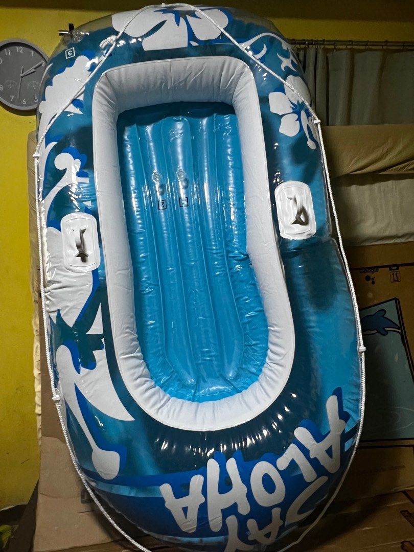 Aloha Inflatable Boat (Category: Water Sports) located in Quezon City. Submitted by daday39 (Listing ID 1399305554, Image 3). Description: - New inflatable boat - Blue and white design with 'Aloha' text - Includes oars - Features carrying handles - Perfect for water activities With plastic paddles No box 198x117cm.