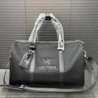 💎誠信賣家💎Arcteryx 始祖鳥 刺繡戶外休閒尼龍布旅行袋機場包手提包袋男女同款64221776365058110